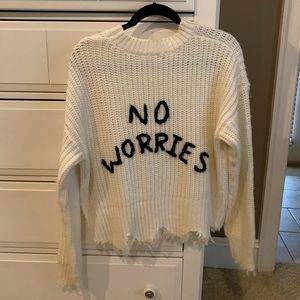White “No Worries” sweater
